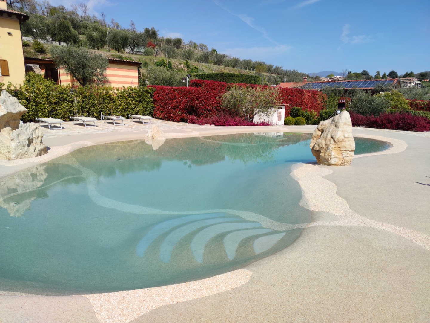 Naturi hand-troweled beach entry sand pool